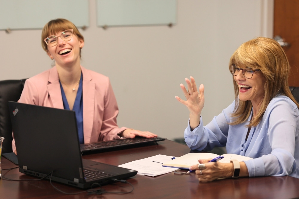 Agile project management discussion during a collaborative healthcare team meeting